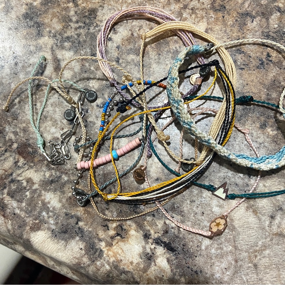 A lot of 10 Pura Vida bracelets